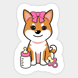 cute baby orange dog wears a pink ribbon Sticker